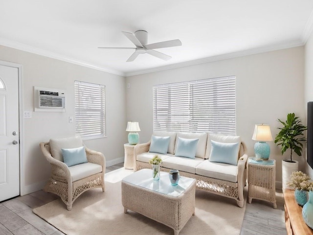 living room featuring ceiling fan, light hardwood / wood-style flooring, ornamental molding, and a wall mounted AC