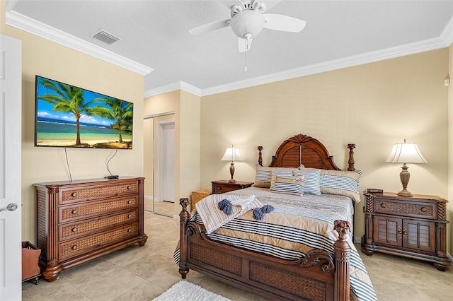 bedroom featuring ornamental molding, a closet, visible vents, and a ceiling fan