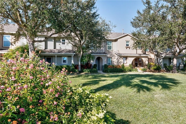 view of front of home with a front yard