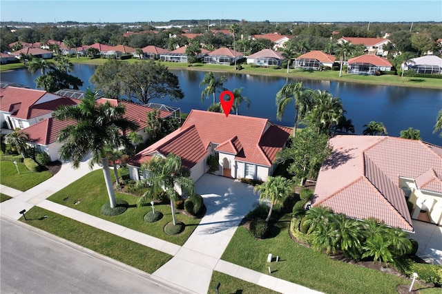 bird's eye view with a water view