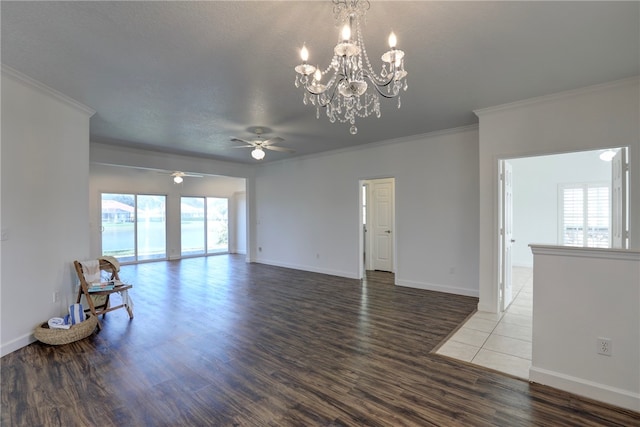 unfurnished living room with a textured ceiling, ceiling fan with notable chandelier, hardwood / wood-style flooring, and crown molding