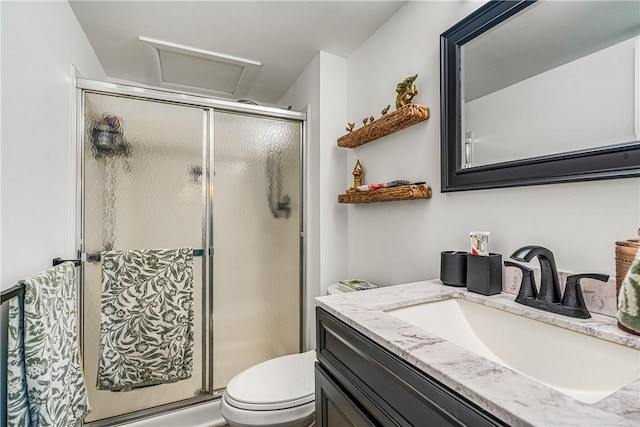 1441 Ocean Dr Unit 207, Vero Beach, FL 32963 - bathroom with a shower stall, toilet, and vanity