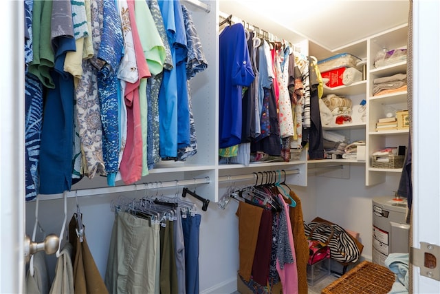 spacious closet featuring water heater