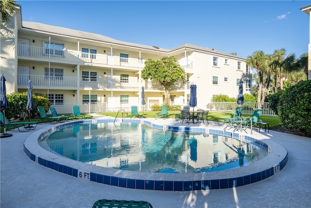 view of pool with a patio