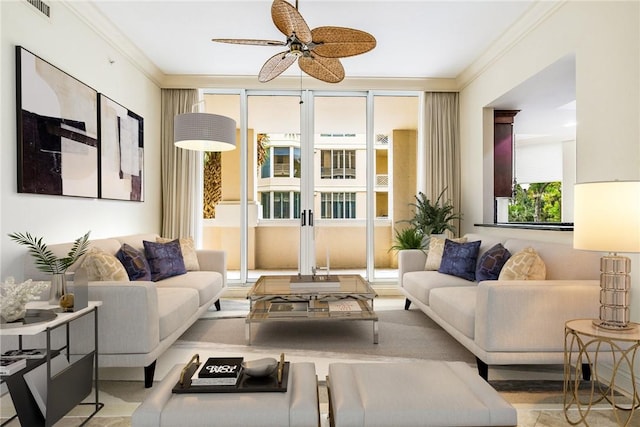 living room with crown molding and a ceiling fan