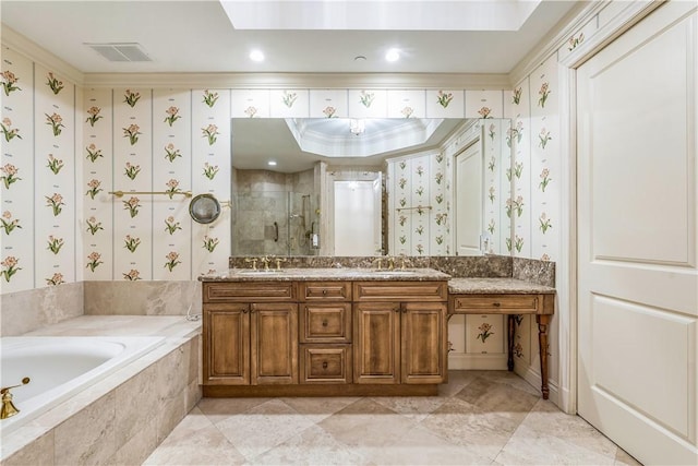 full bathroom featuring wallpapered walls, a stall shower, visible vents, and a sink