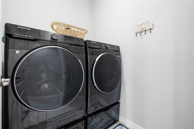 laundry room with separate washer and dryer