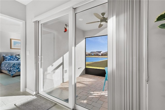 entryway with ceiling fan