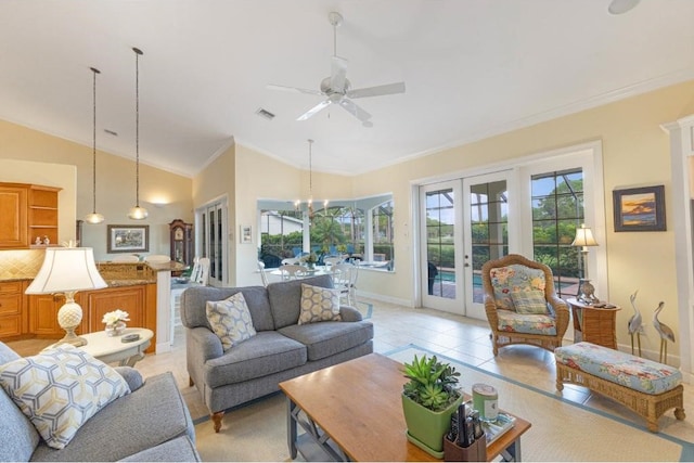 tiled living room with ceiling fan with notable chandelier, vaulted ceiling, ornamental molding, and french doors