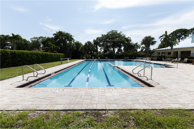 view of pool featuring a patio area