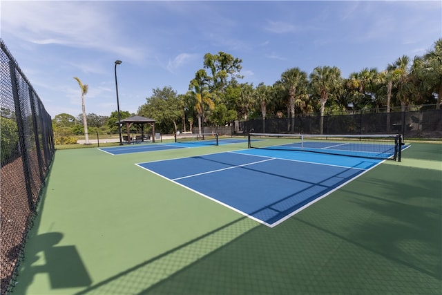 view of sport court with a gazebo and basketball court