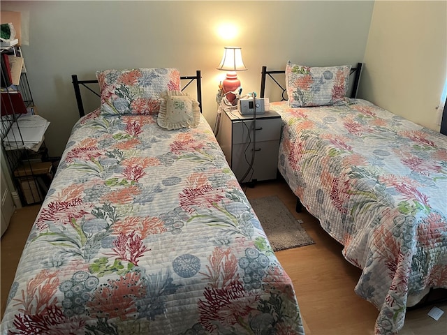 bedroom with light hardwood / wood-style flooring