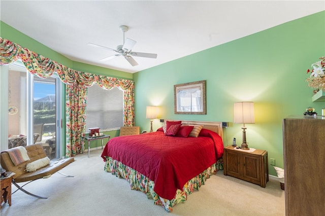 430 25th Ave SW, Vero Beach, FL 32962 - carpeted bedroom featuring access to exterior and a ceiling fan