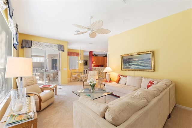 living room featuring ceiling fan and light carpet