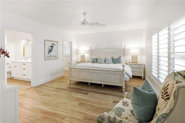 bedroom featuring ensuite bathroom, ceiling fan, and light hardwood / wood-style floors