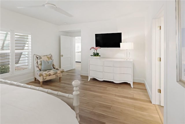 bedroom featuring ceiling fan and light hardwood / wood-style flooring