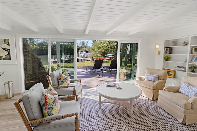 sunroom / solarium with beamed ceiling