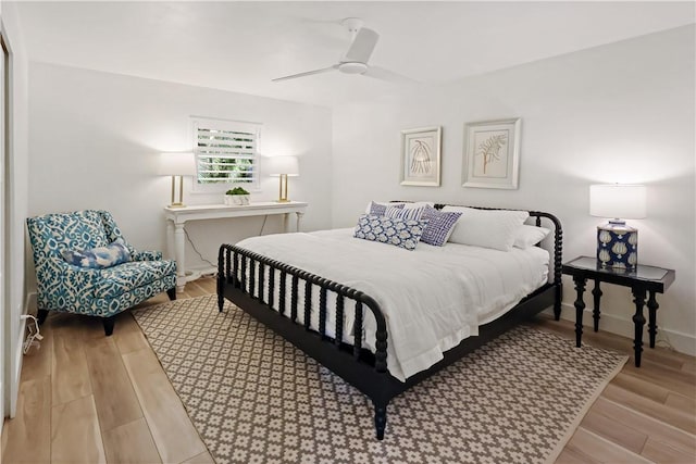 bedroom featuring ceiling fan and light hardwood / wood-style floors