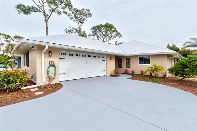 single story home featuring a garage