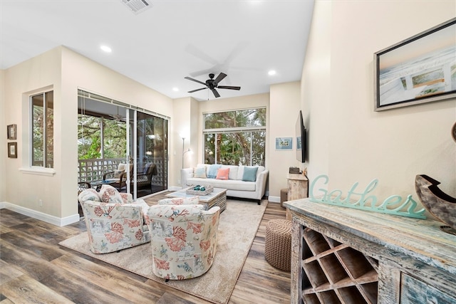 1335 Winding Oaks Cir E Unit 1007, Vero Beach, FL 32963 - living area featuring plenty of natural light, wood finished floors, recessed lighting, and ceiling fan