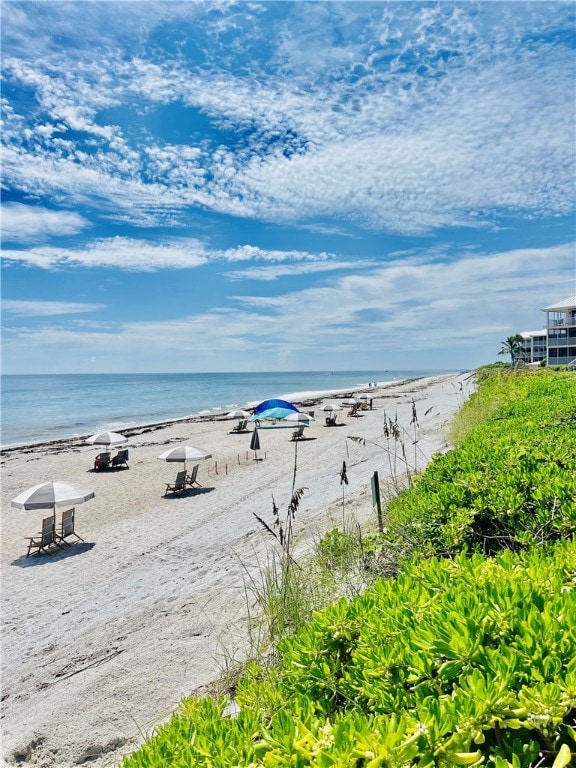 1335 Winding Oaks Cir E Unit 1007, Vero Beach, FL 32963 - water view featuring nearby beach