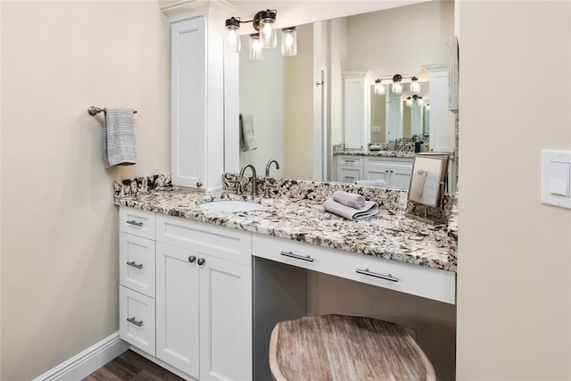 1335 Winding Oaks Cir E Unit 1007, Vero Beach, FL 32963 - bathroom with vanity and wood finished floors