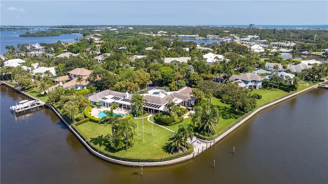 bird's eye view with a water view