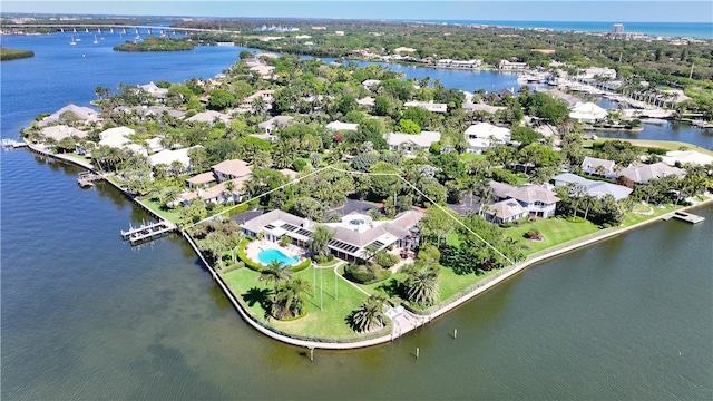 drone / aerial view with a water view