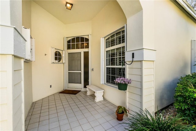 entrance to property with a patio area