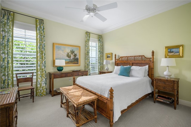 bedroom featuring ornamental molding, light colored carpet, and multiple windows