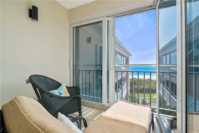 balcony featuring a water view