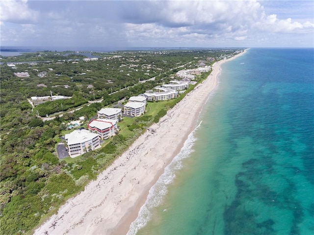 bird's eye view with a view of the beach and a water view