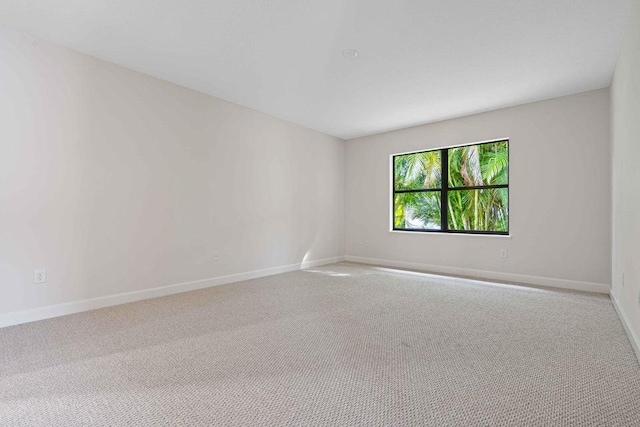 spare room featuring carpet flooring