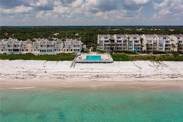 aerial view with a beach view and a water view