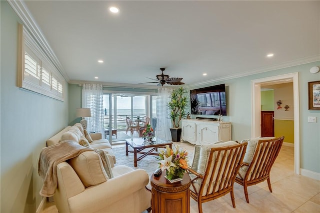 tiled living room featuring ceiling fan and crown molding