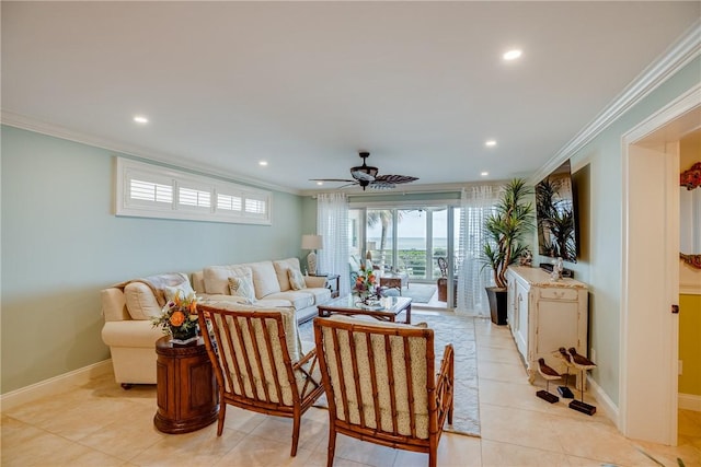 living room with ceiling fan, light tile patterned floors, and crown molding