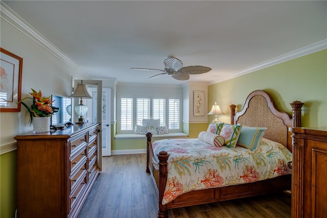 bedroom with ceiling fan, dark hardwood / wood-style flooring, and ornamental molding