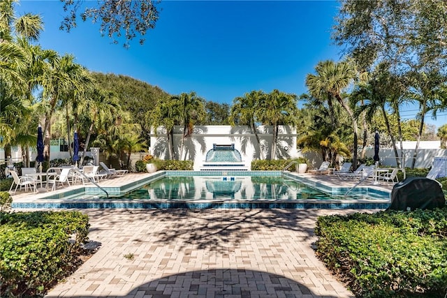 view of pool featuring a patio