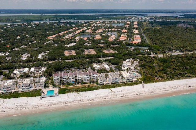 bird's eye view with a beach view and a water view