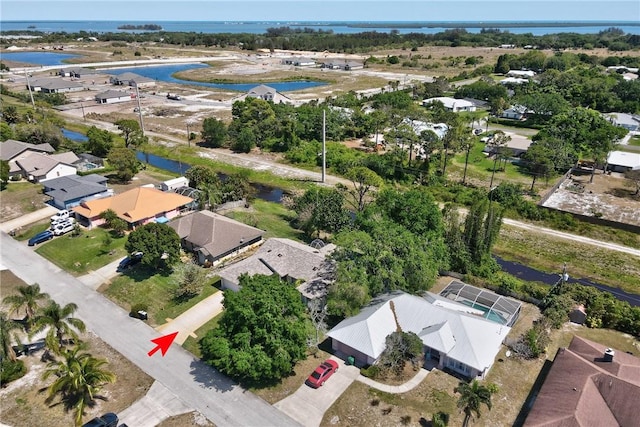 aerial view featuring a water view