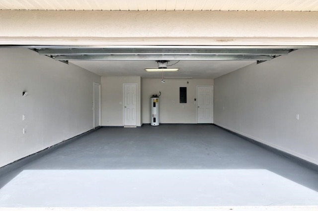 garage featuring a garage door opener, electric water heater, and electric panel