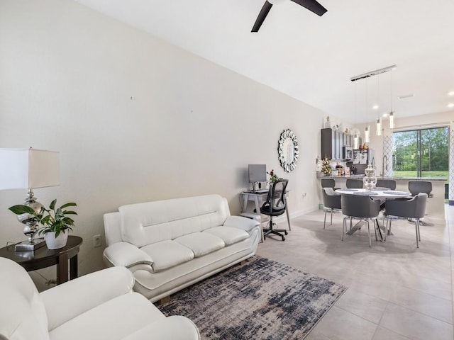 living room with ceiling fan