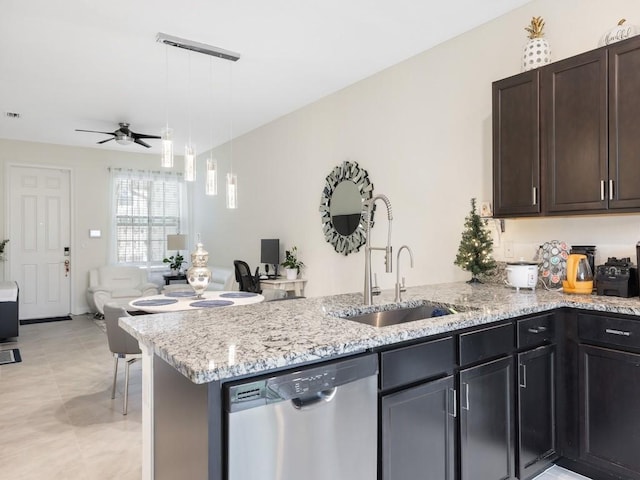 kitchen featuring dishwasher, kitchen peninsula, ceiling fan, dark brown cabinetry, and decorative light fixtures