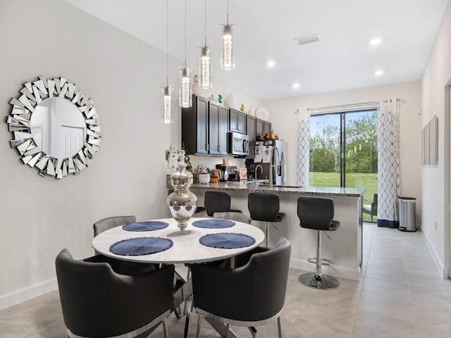 dining space with sink