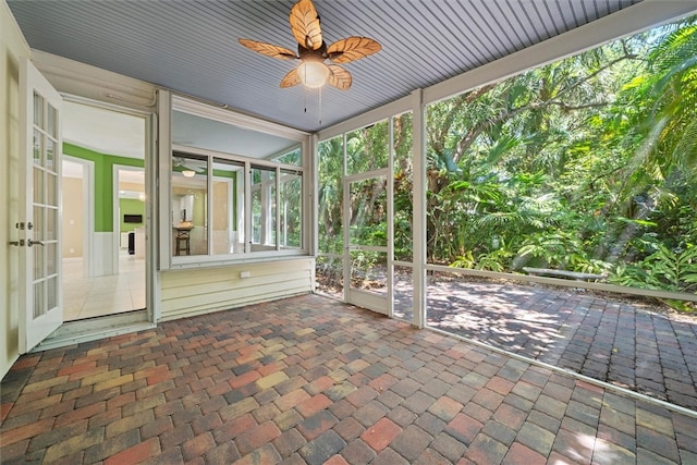 1619 Bent Oak Ln, Vero Beach, FL 32963 - unfurnished sunroom featuring ceiling fan