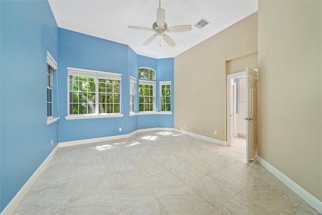 1619 Bent Oak Ln, Vero Beach, FL 32963 - empty room featuring crown molding, a ceiling fan, and baseboards