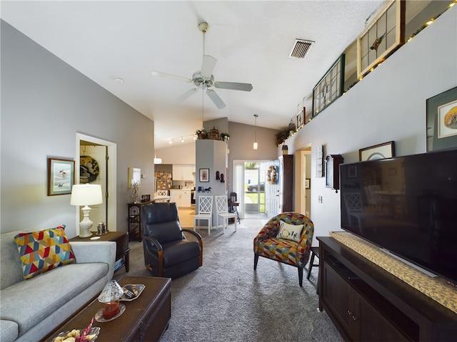 living room featuring carpet flooring, ceiling fan, and high vaulted ceiling