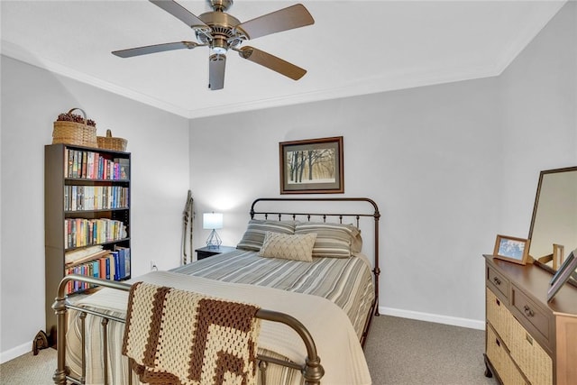 bedroom with ornamental molding, light colored carpet, ceiling fan, and baseboards