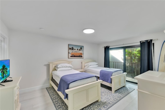 bedroom with light wood-type flooring