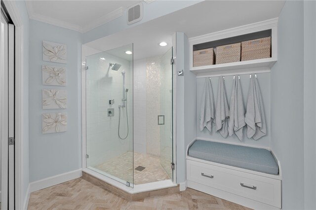 bathroom with a stall shower, crown molding, baseboards, and recessed lighting